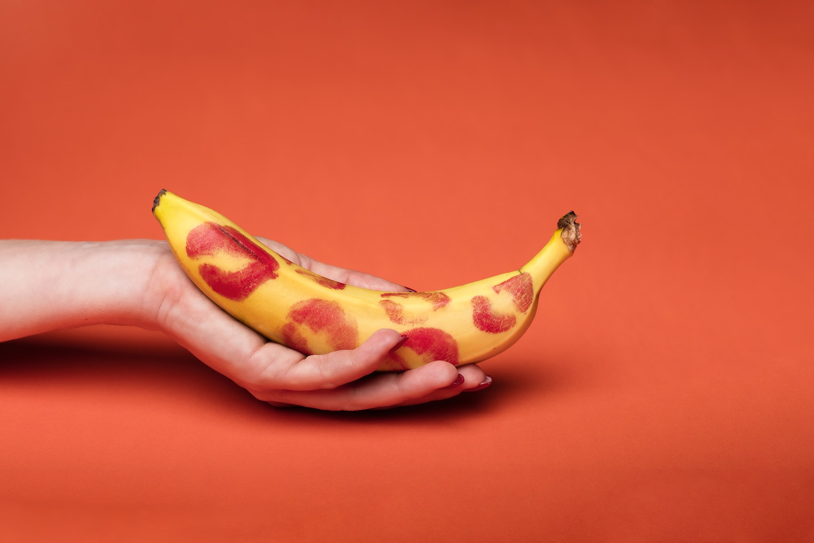 person holding yellow banana fruit